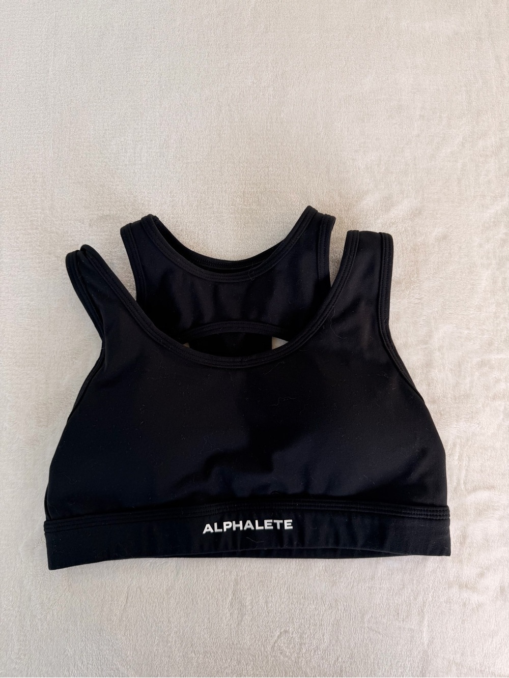 Alphalete black surface keyhole sports bra